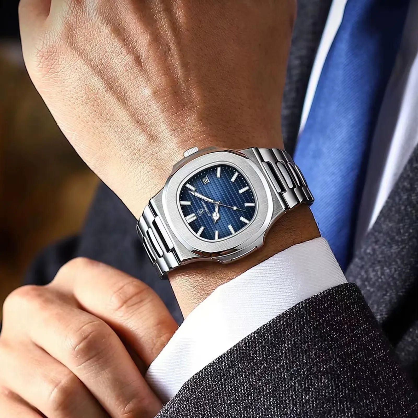 POEDAGAR stainless steel men’s watch with blue dial and date window